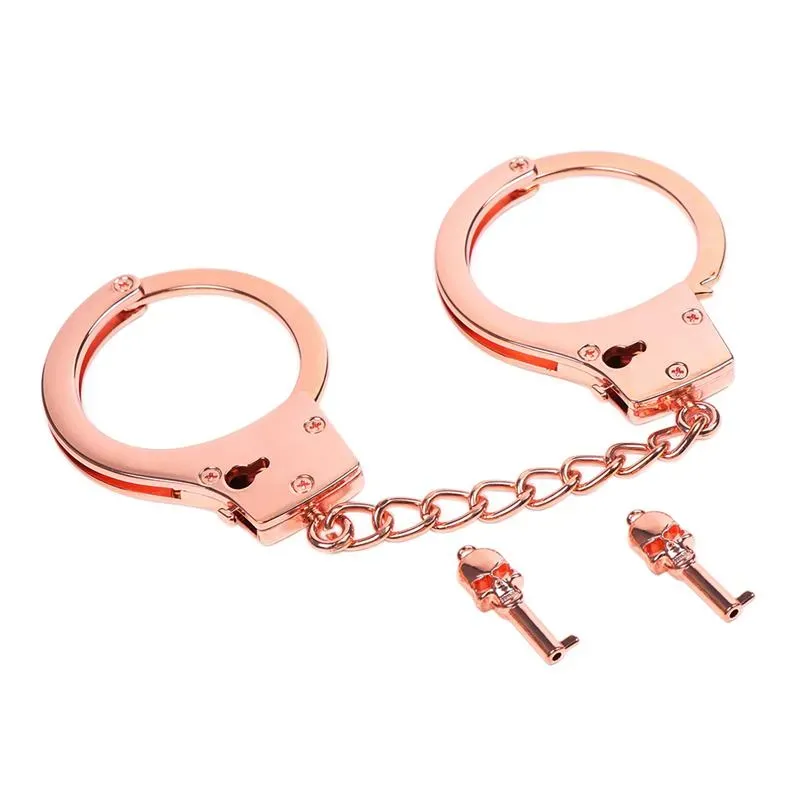 Esposas Oro Rosa con Llaves de Calavera – Esposas y Antifaces
